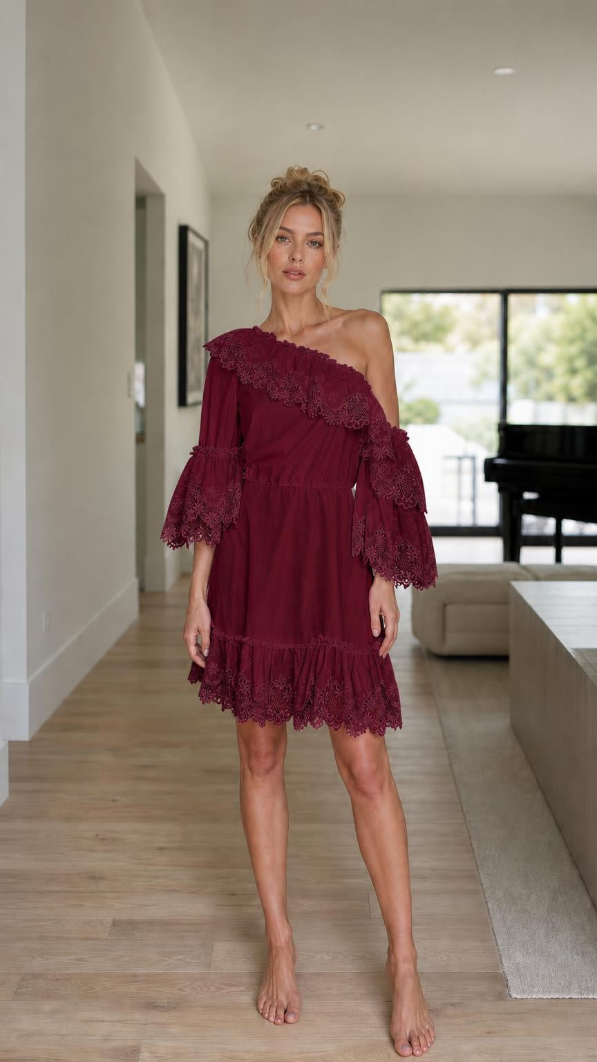 Front view of model wearing burgundy one-shoulder ruffle lace mini dress