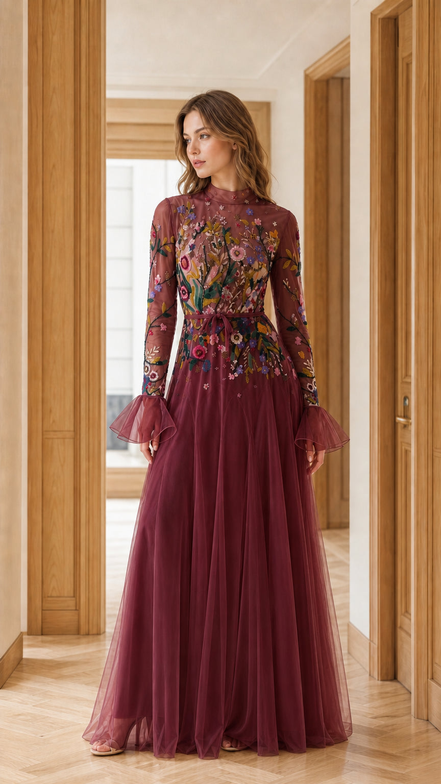 Front view of burgundy wine floral embroidered tulle evening gown with bell sleeves