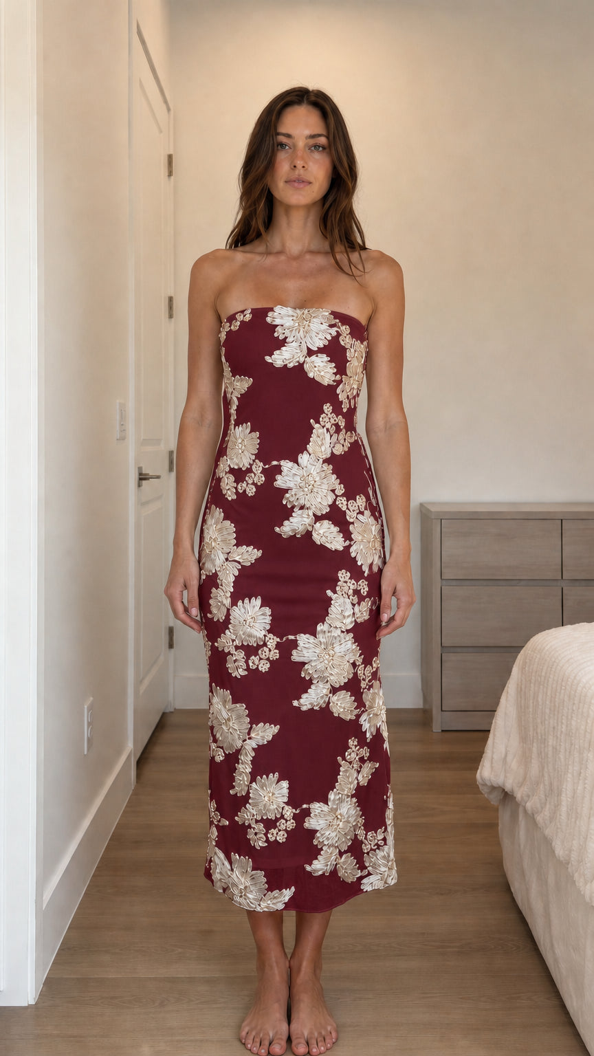 Front view of burgundy strapless floral applique midi dress