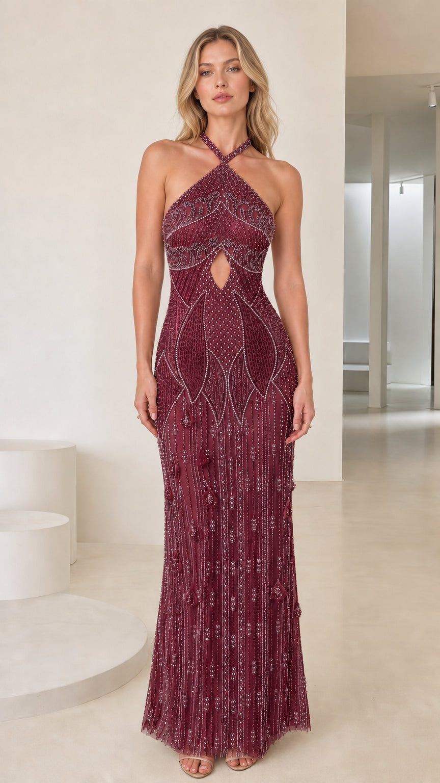 Front view of burgundy beaded halter neck evening dress