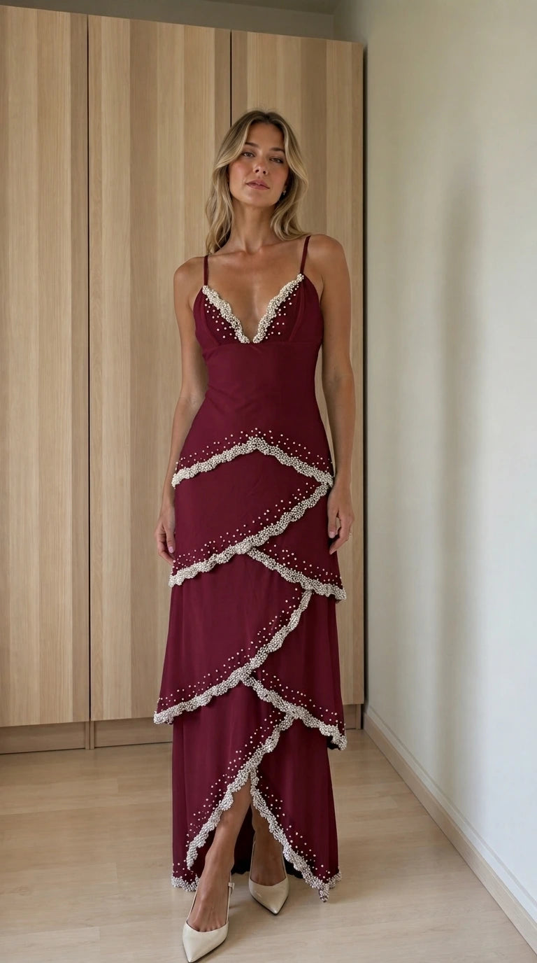 Front view of burgundy tiered beaded maxi dress