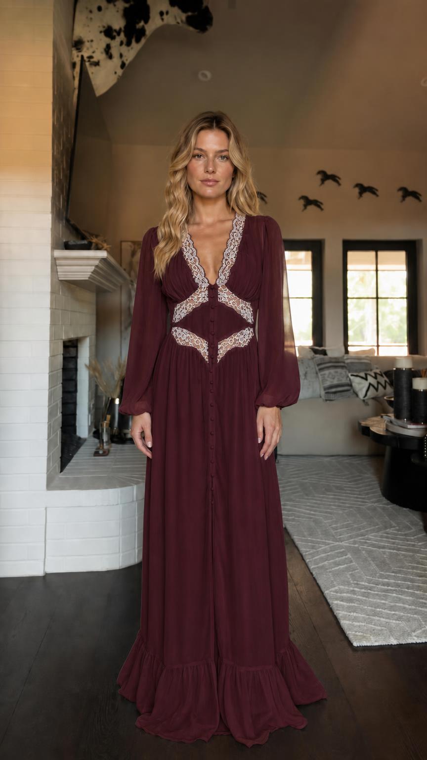 Front view of woman wearing burgundy long sleeve maxi dress