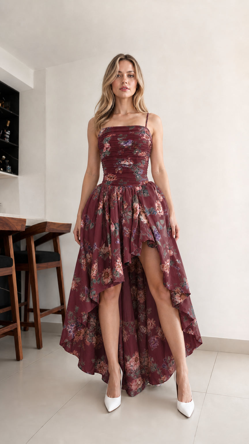 Woman wearing burgundy floral high-low cami dress