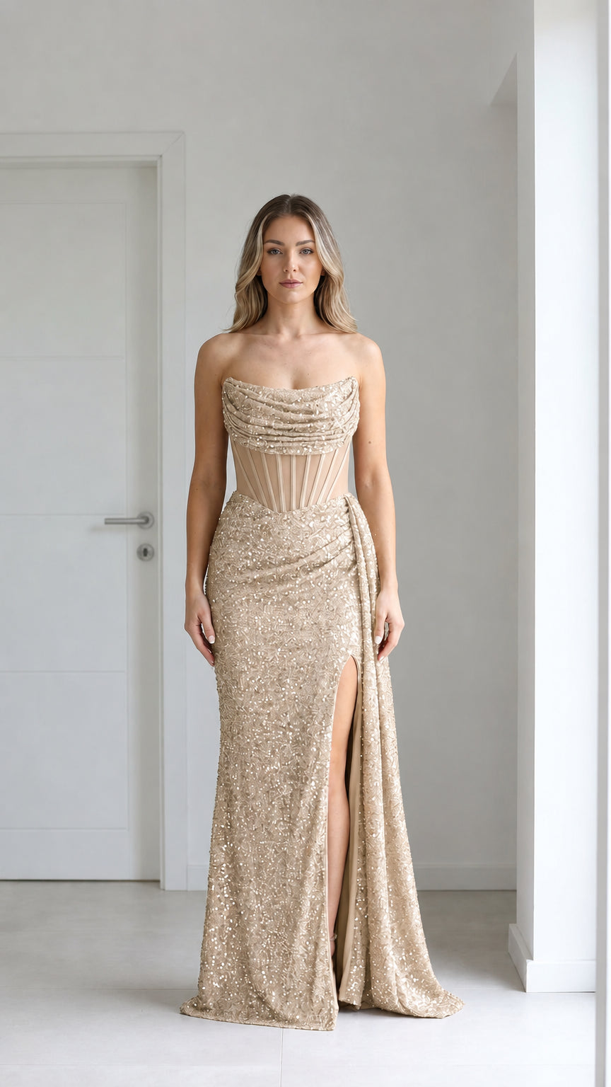 Front view of champagne gold sequin evening gown with high slit