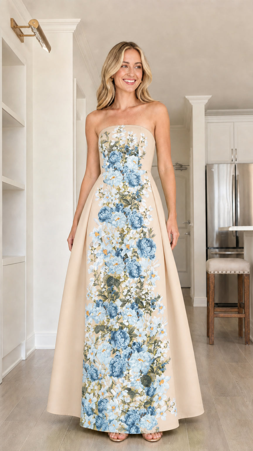 Front view of model in champagne floral strapless maxi dress