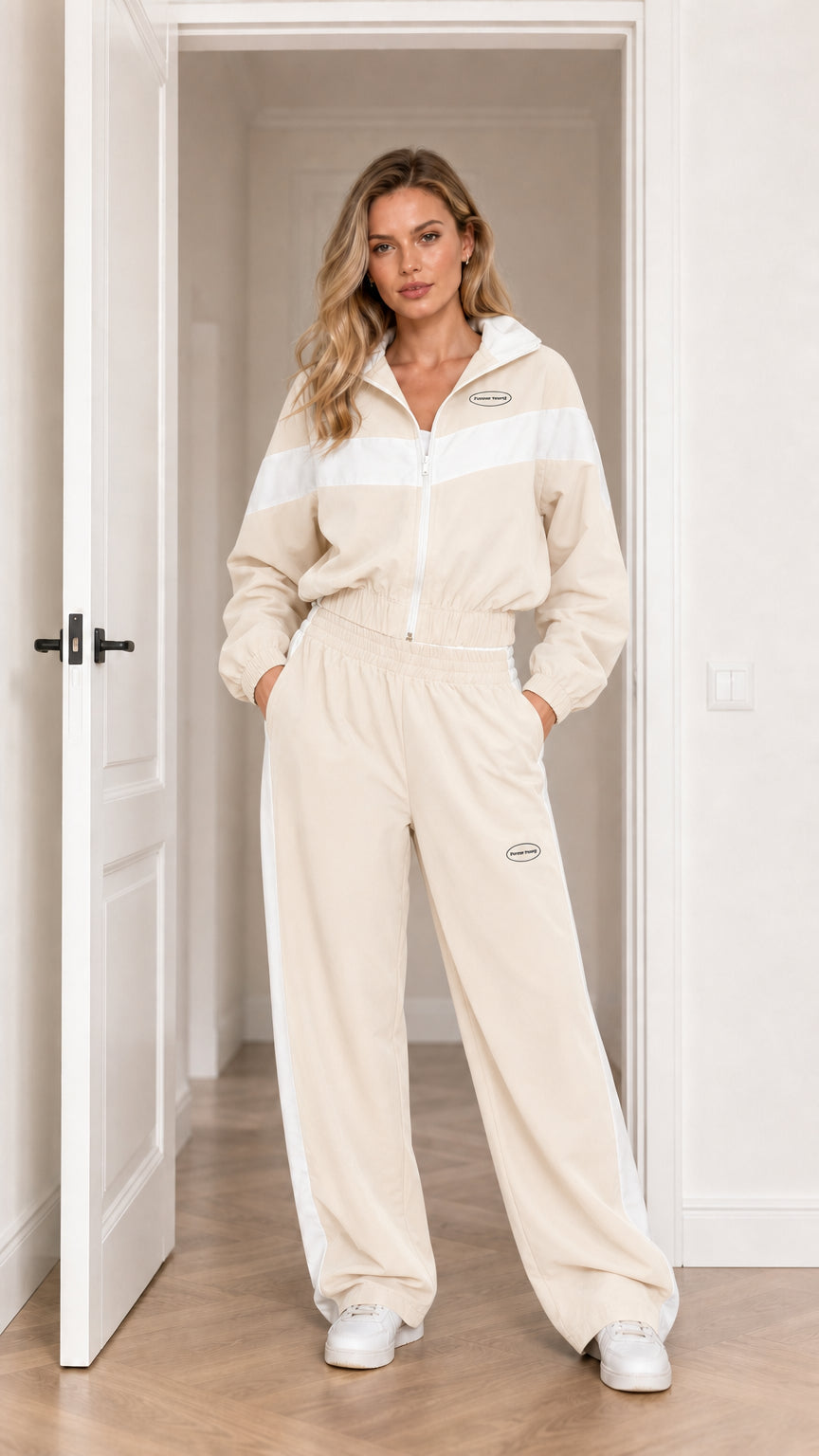 Model wearing Beige colorblock zip-front jacket and wide-leg pant set