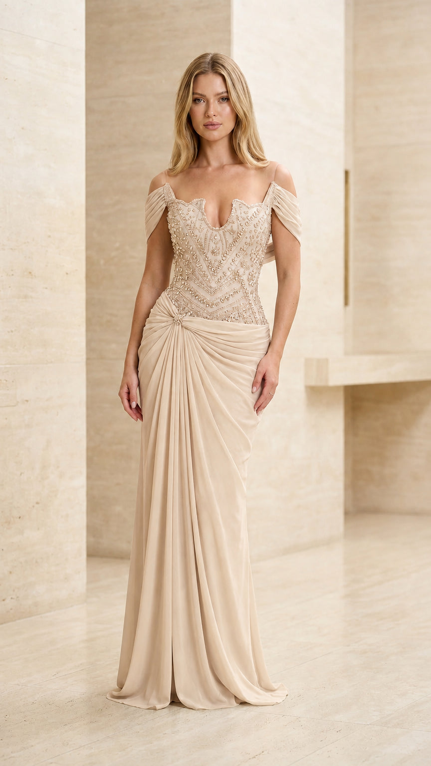 Model wearing champagne gold beaded off-the-shoulder evening dress