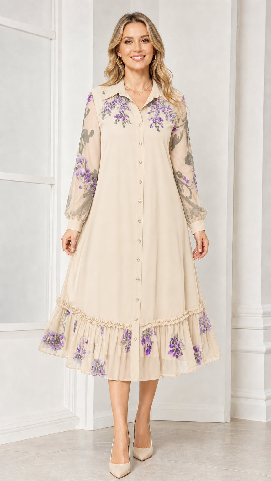 Front view of woman wearing beige floral embroidered midi dress