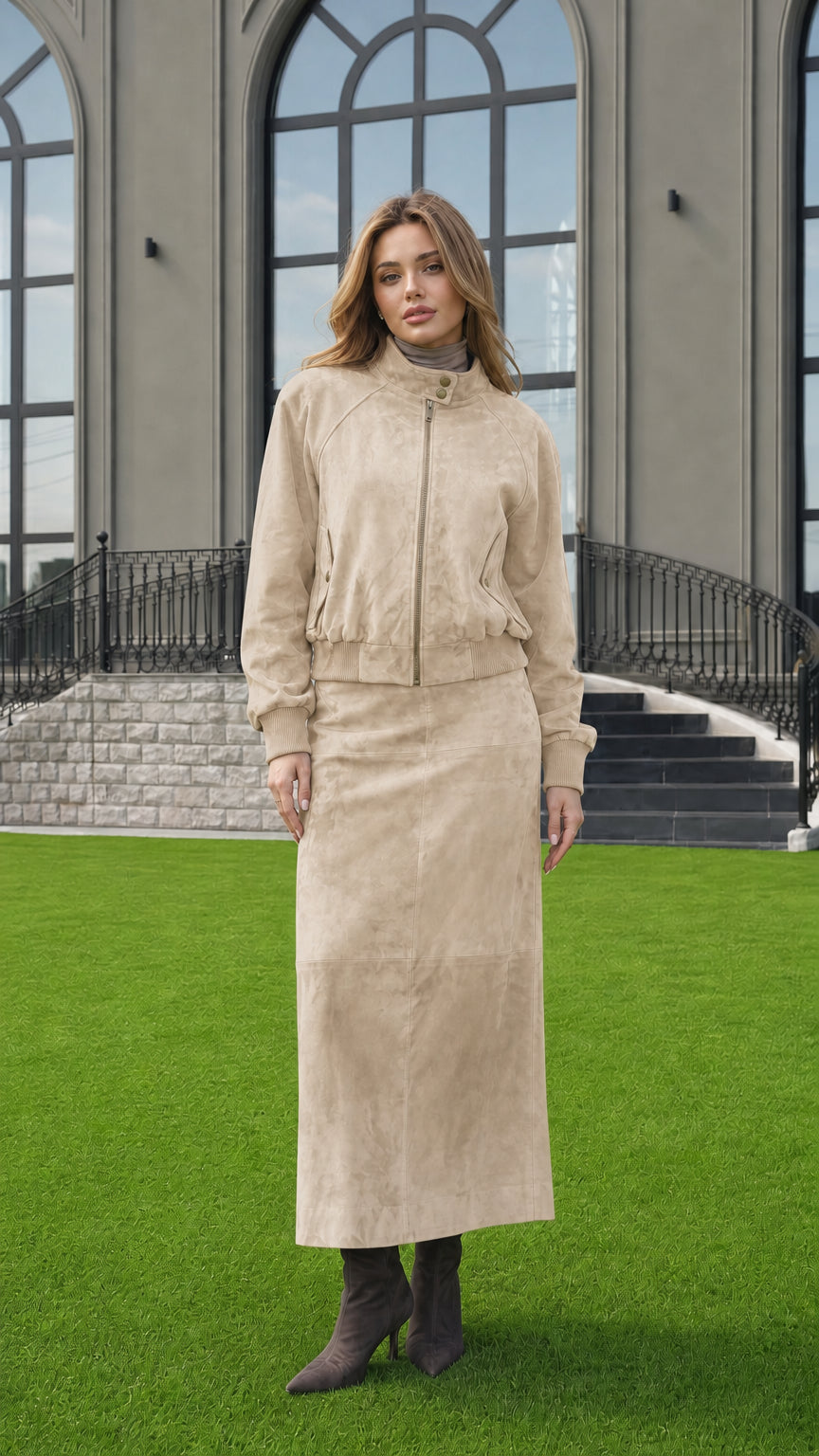 Full-length view of woman modeling Sand Beige faux suede jacket and maxi skirt ensemble