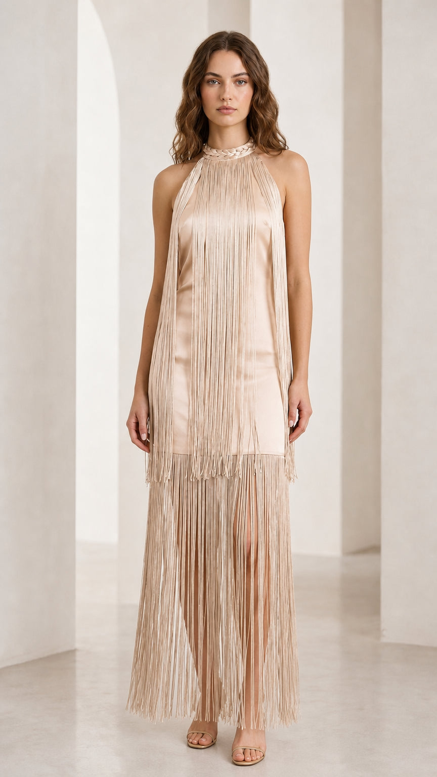 Front view of champagne color variant of fringe maxi dress