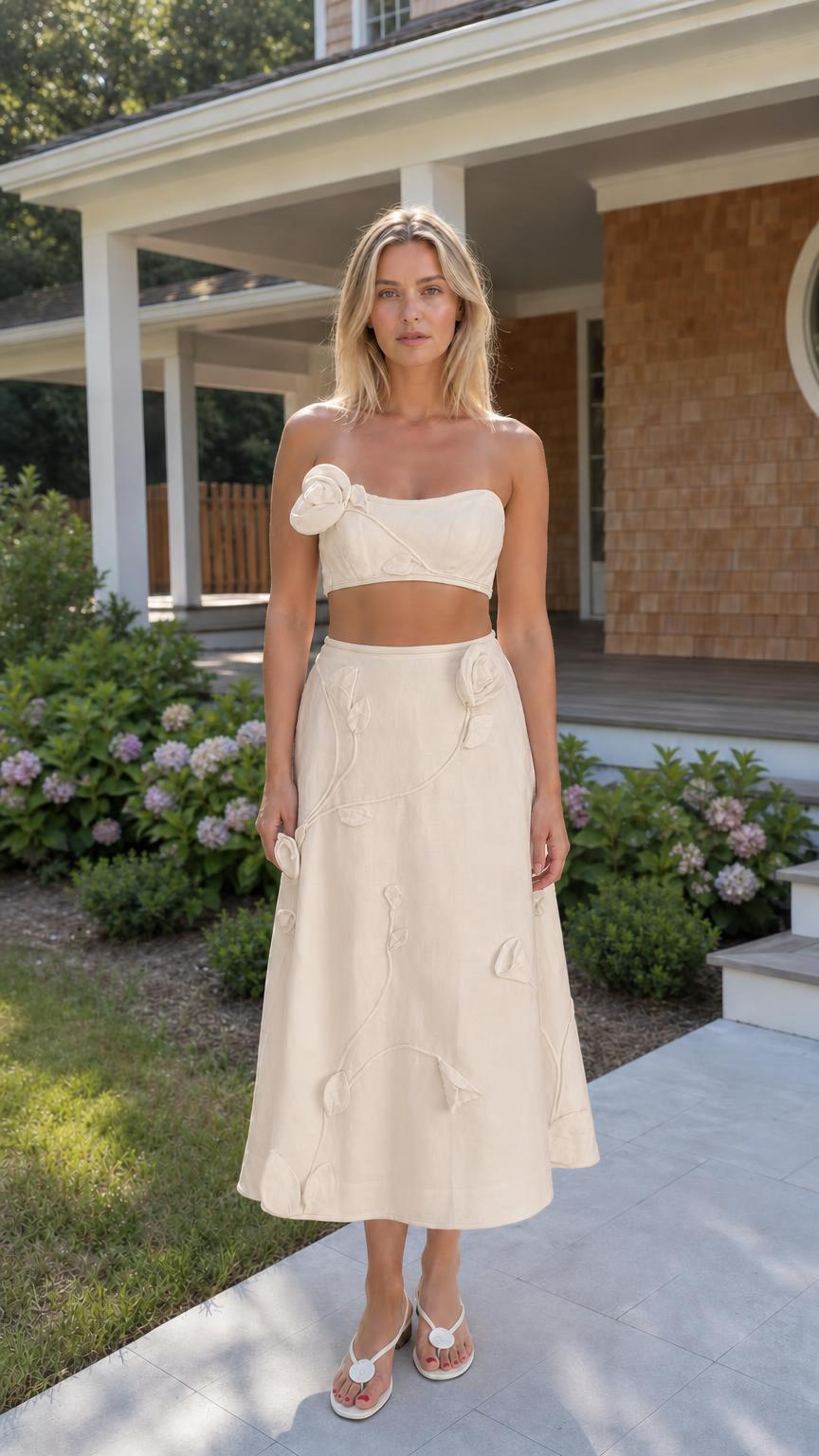 Front view of woman wearing beige floral applique two-piece set