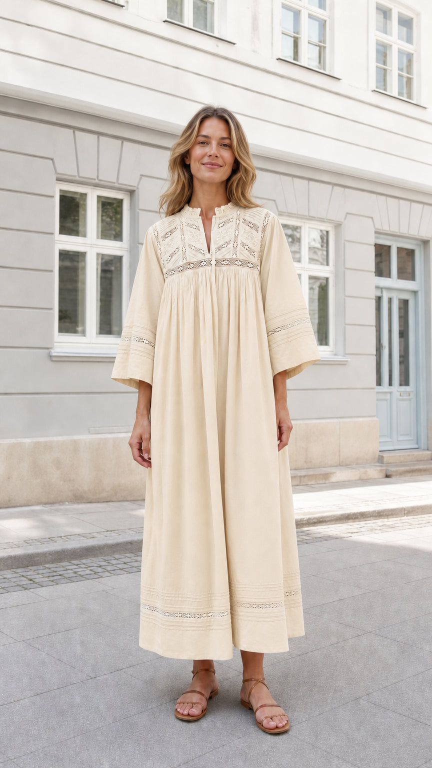 Woman wearing Cream ivory embroidered relaxed fit maxi dress