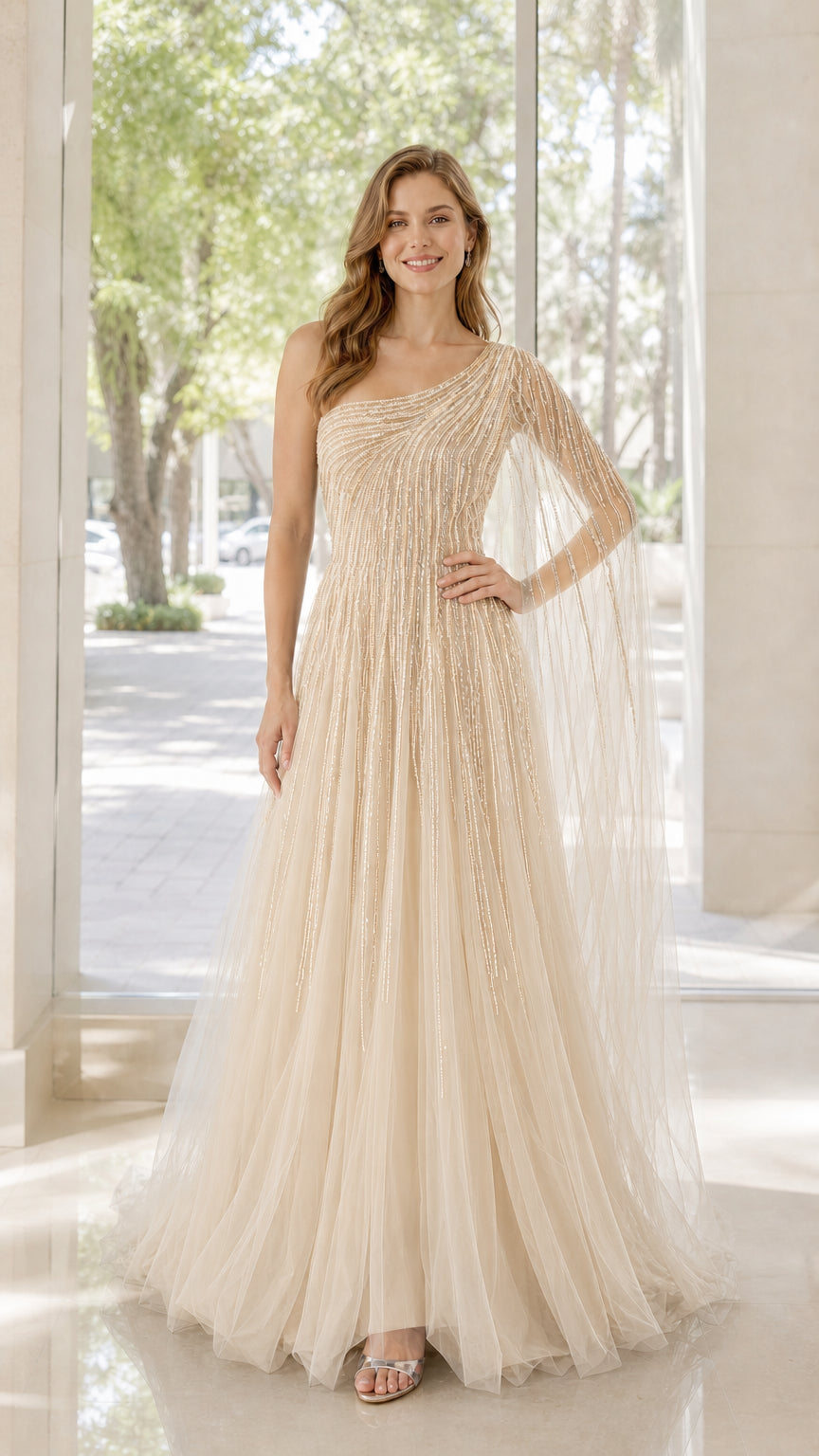 Front view of model wearing champagne one-shoulder beaded tulle evening dress