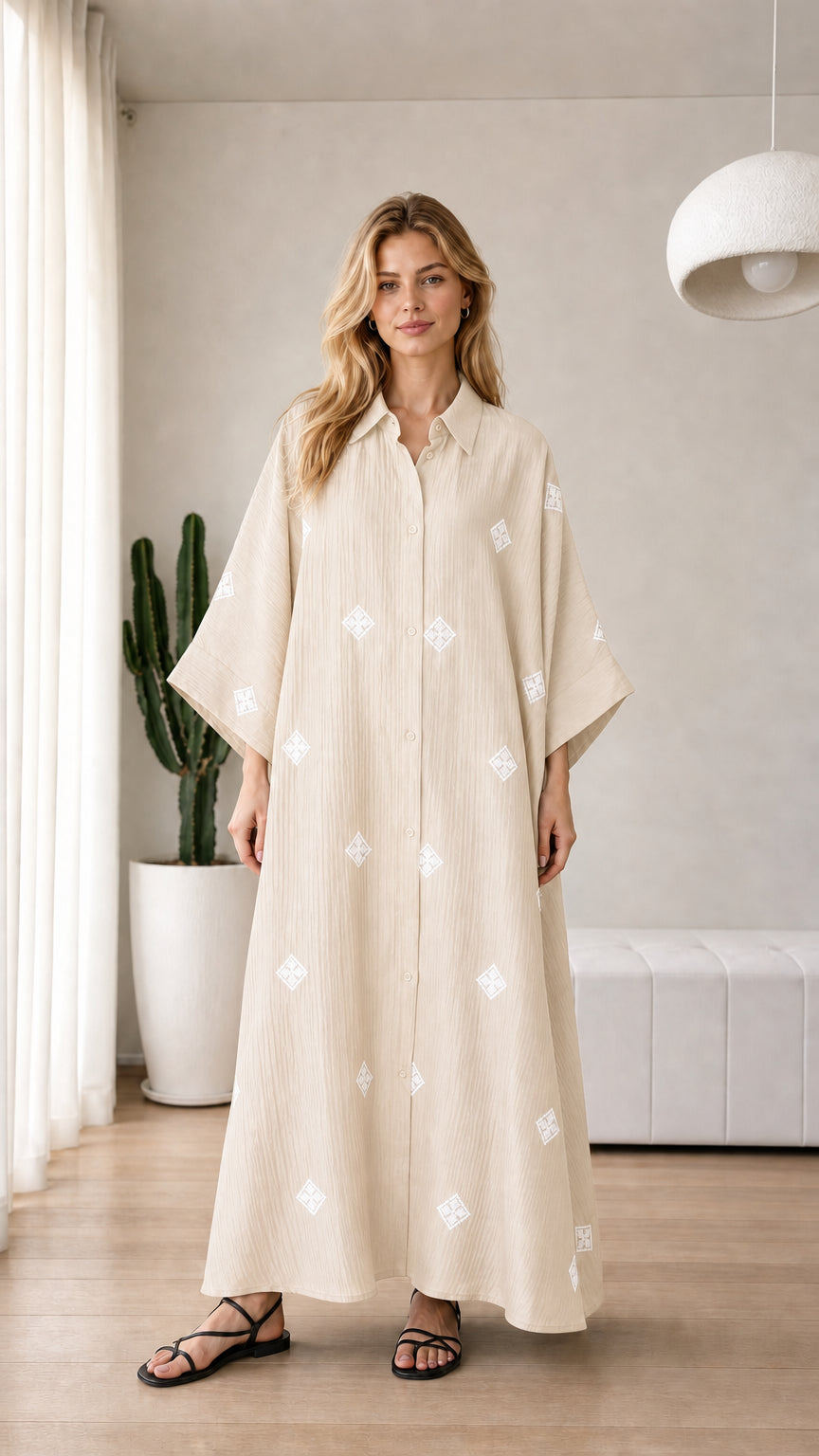 Beige cream loose-fitting embroidered maxi shirt dress on model