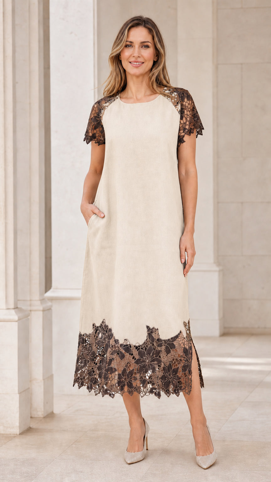 Model wearing beige midi dress with contrasting dark lace