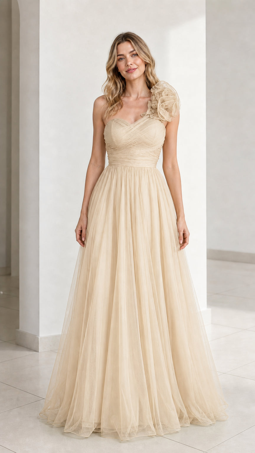Front view of champagne one-shoulder tulle evening gown