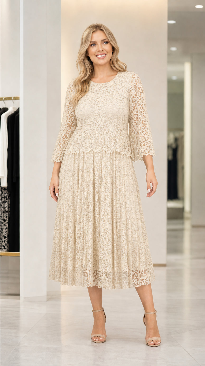 Front view of woman wearing champagne lace midi dress