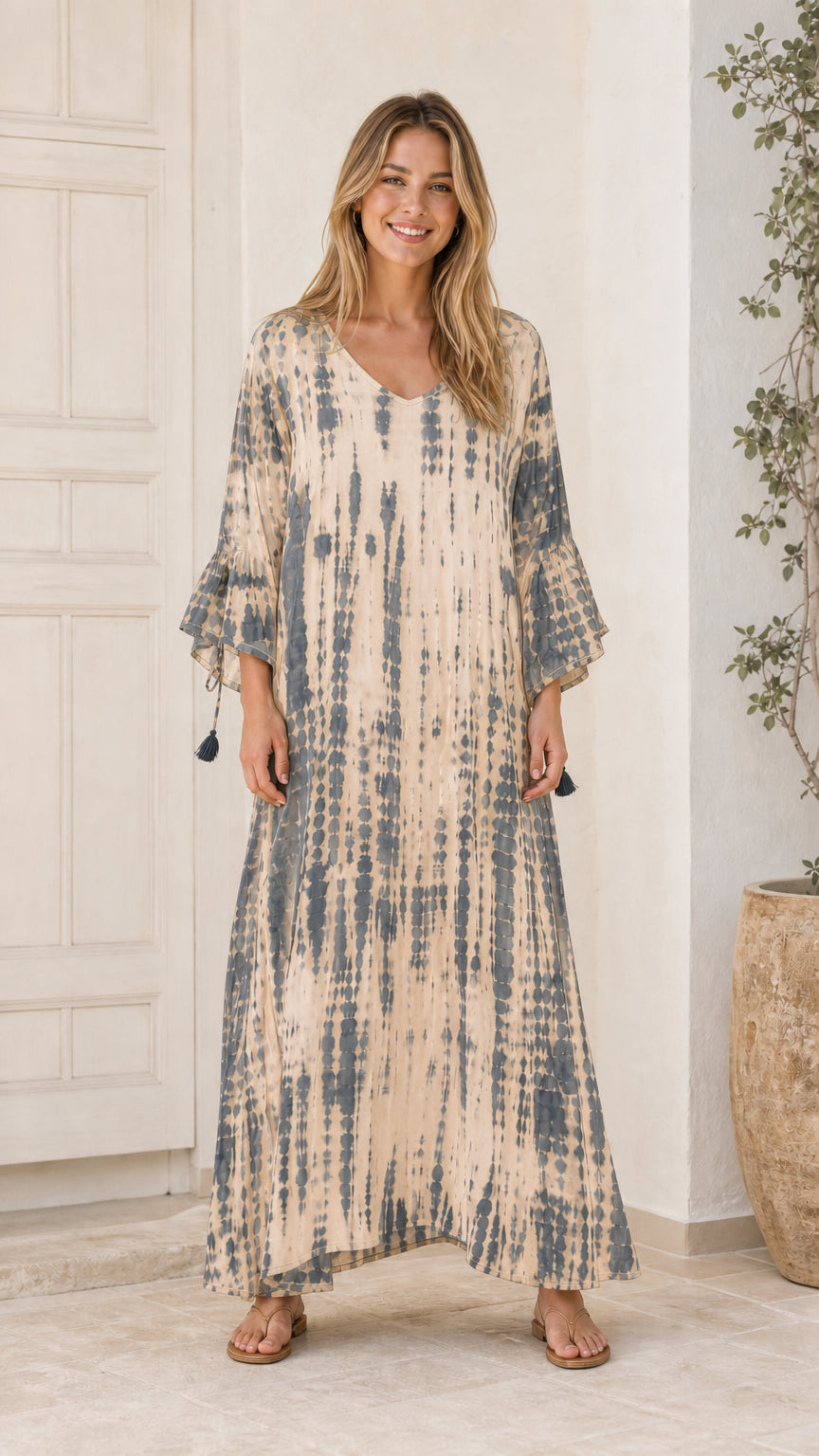 Model wearing Beige tie-dye maxi dress