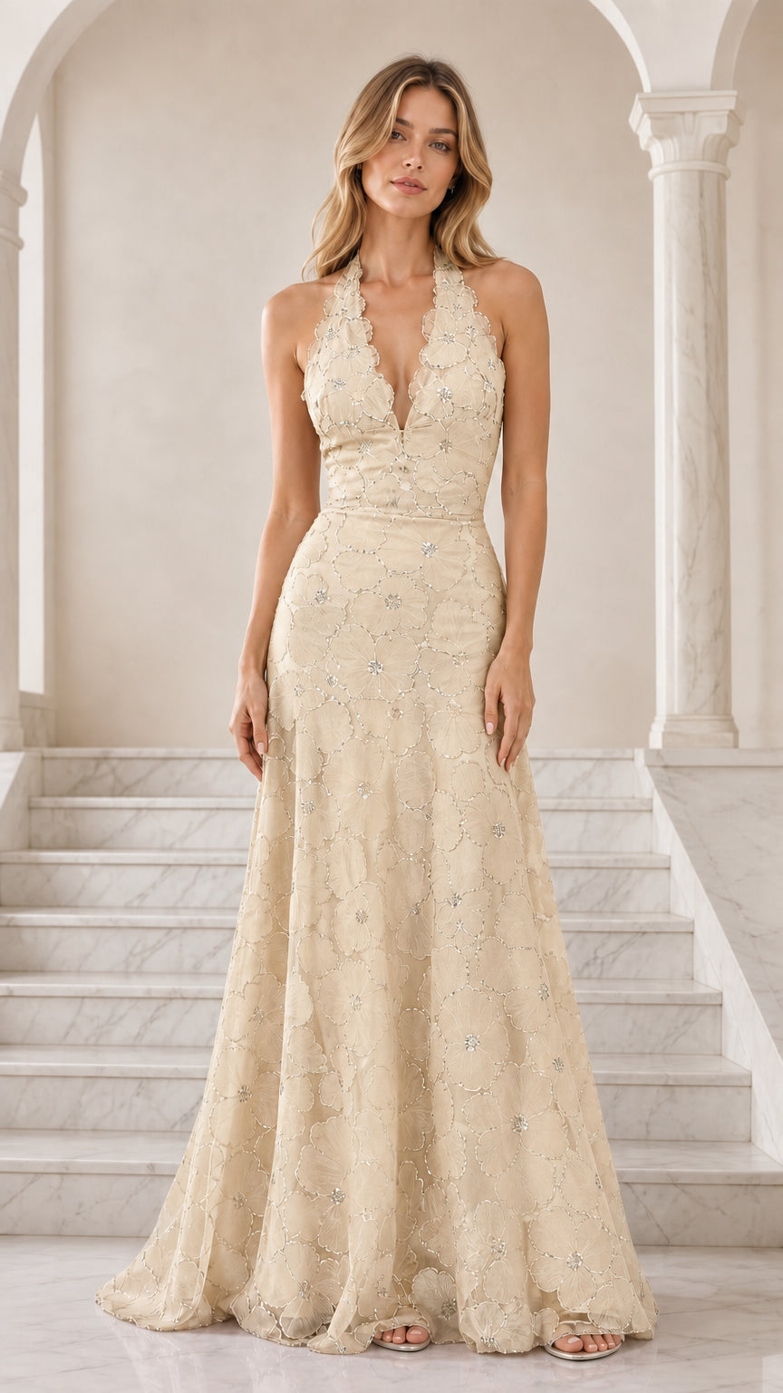 Front view of champagne cream floral embroidered halter formal maxi dress