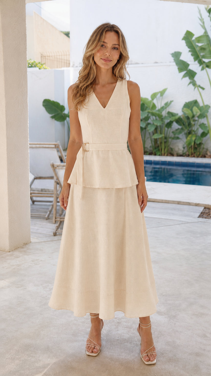 Woman wearing cream V-neck peplum midi dress