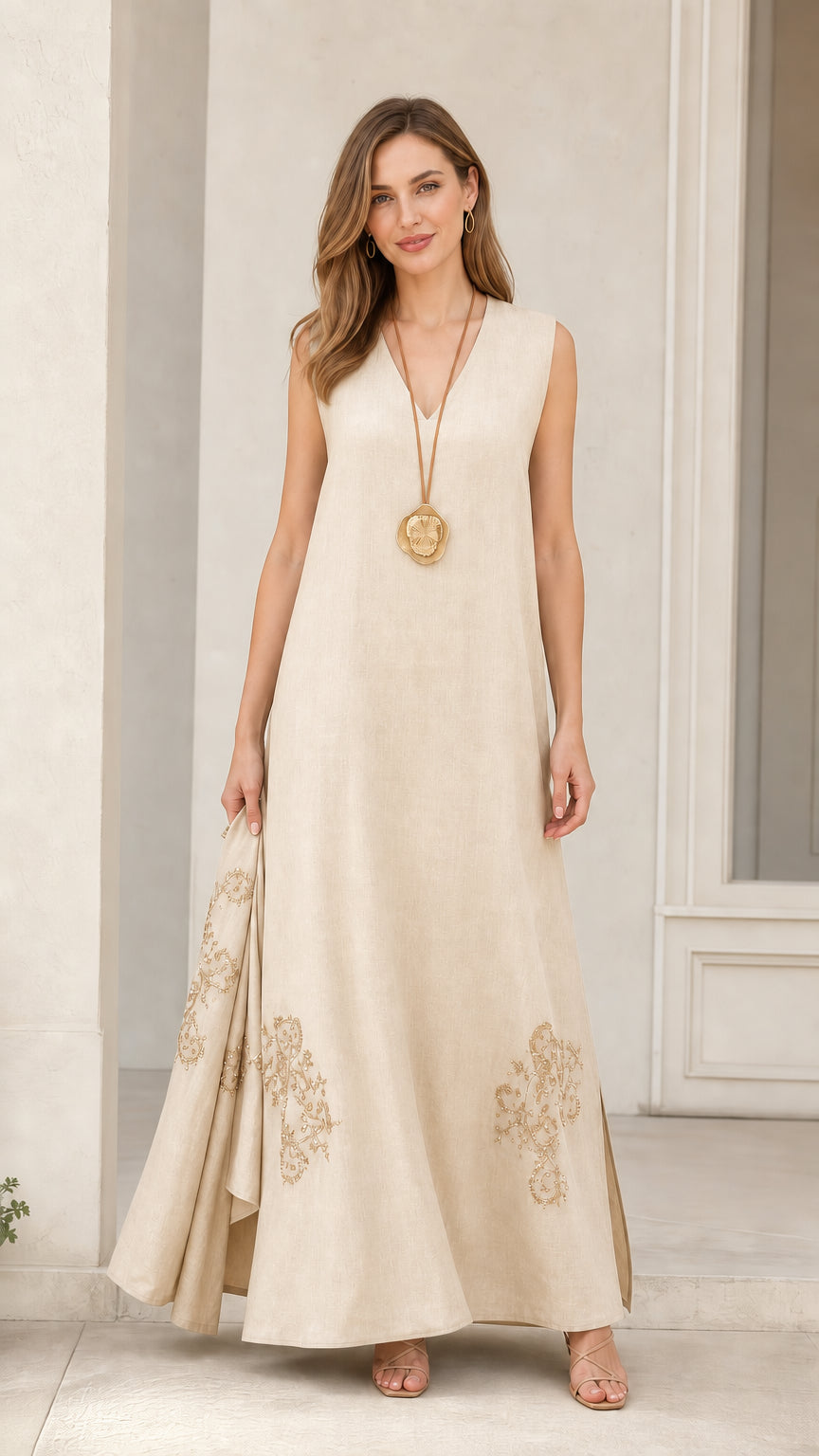 Front view of model wearing beige sleeveless maxi dress
