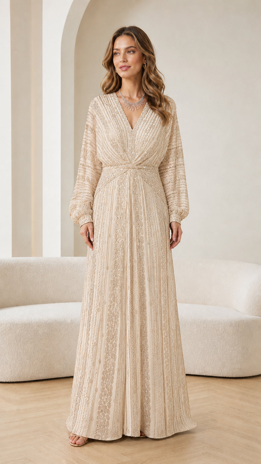 Full-length view of woman modeling champagne gold embellished long sleeve maxi dress