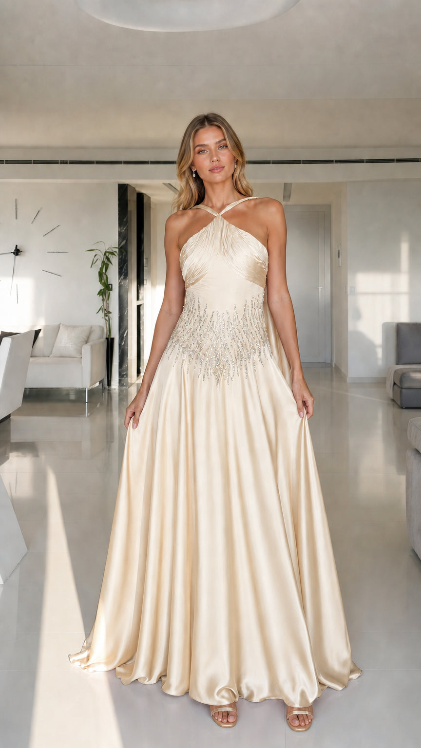 Model wearing champagne halter neck satin maxi dress