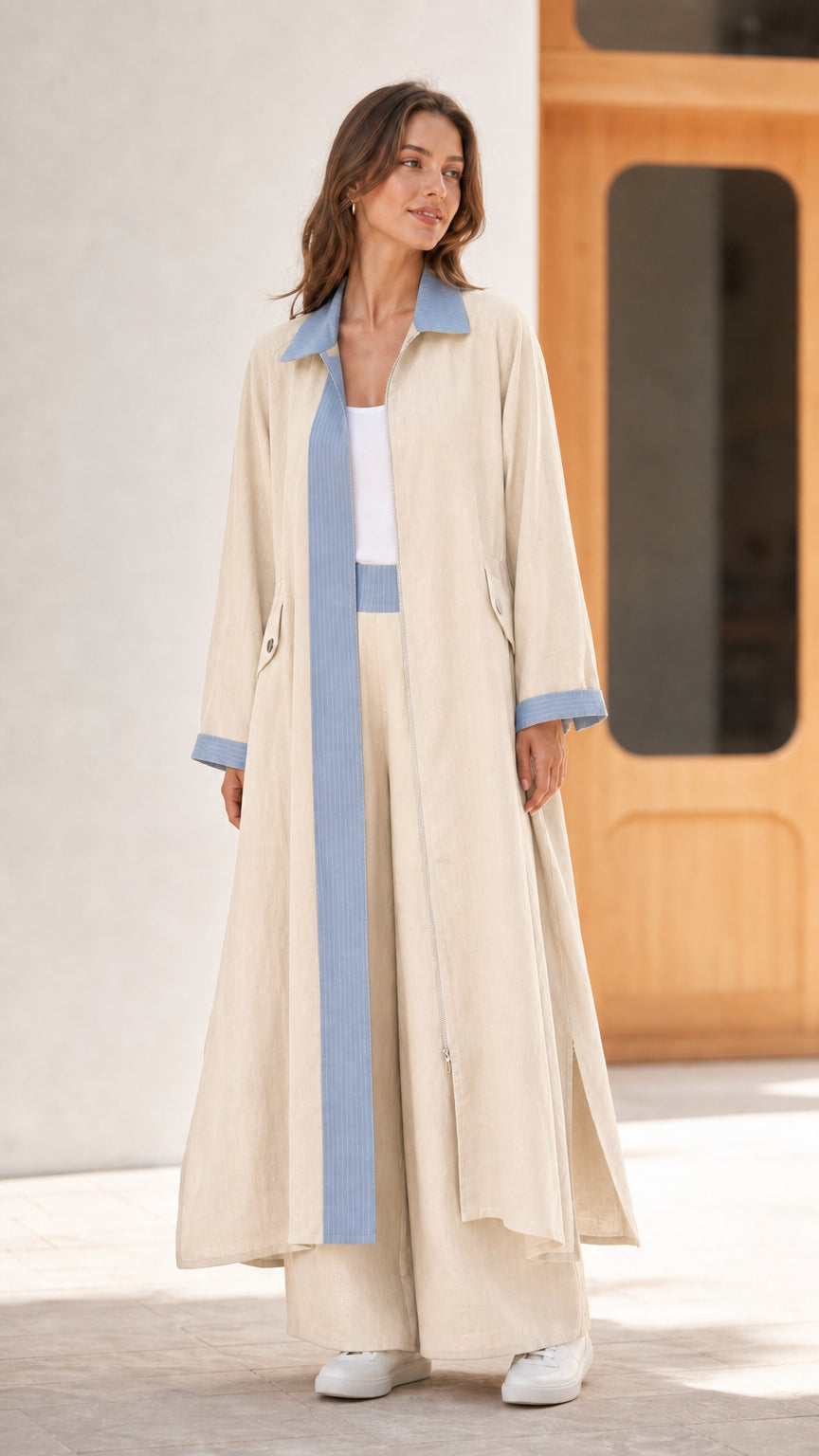 Full length view of beige cream duster and wide-leg pants two-piece set