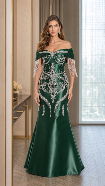 Front view of emerald green off-shoulder rhinestone fringe mermaid evening gown