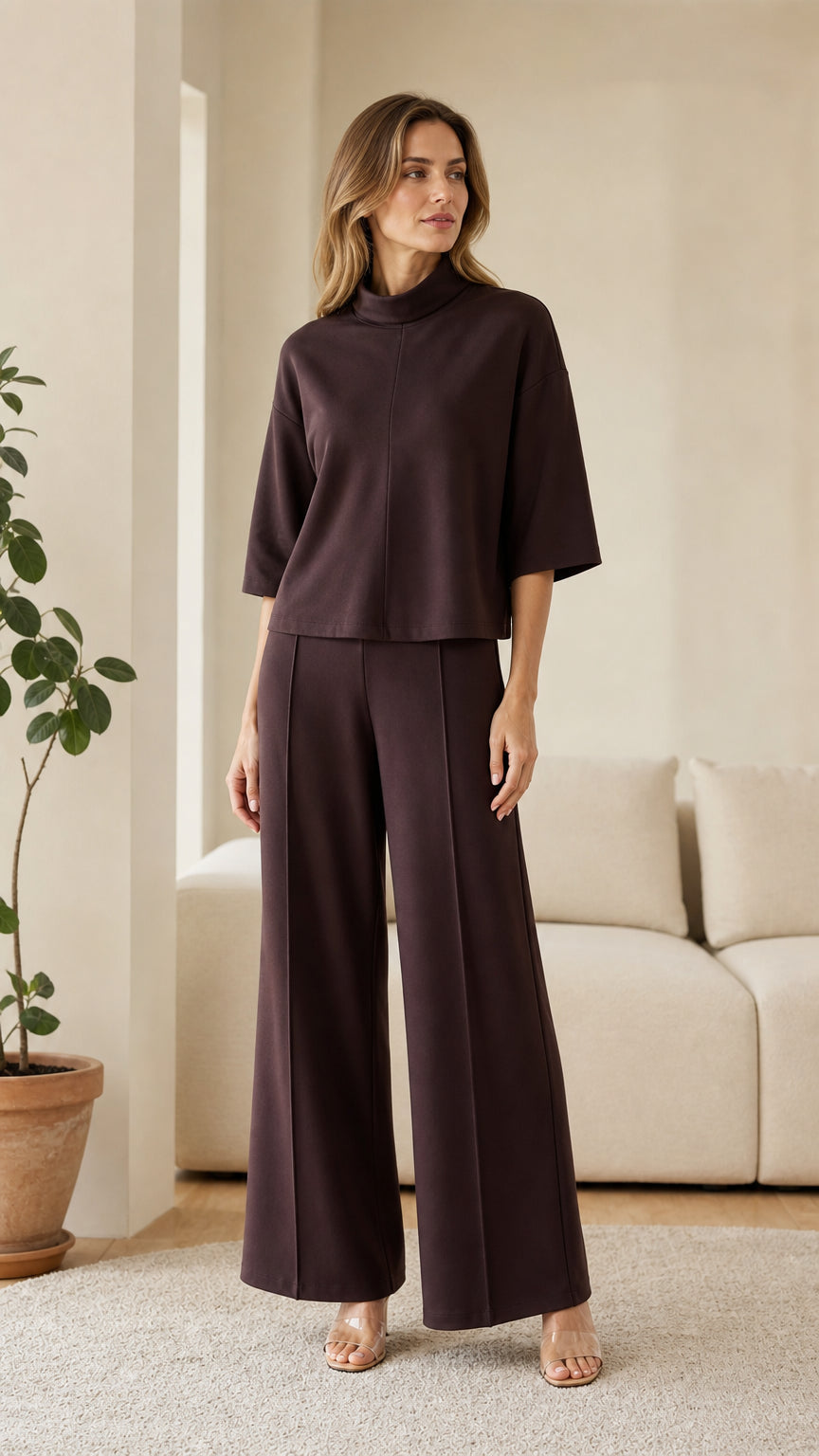 Front view of woman wearing dark brown mock neck lounge set