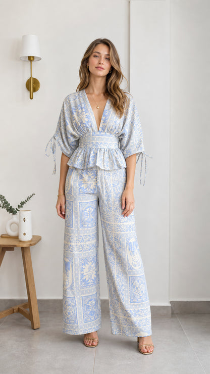 Front view of model wearing light blue printed two-piece set
