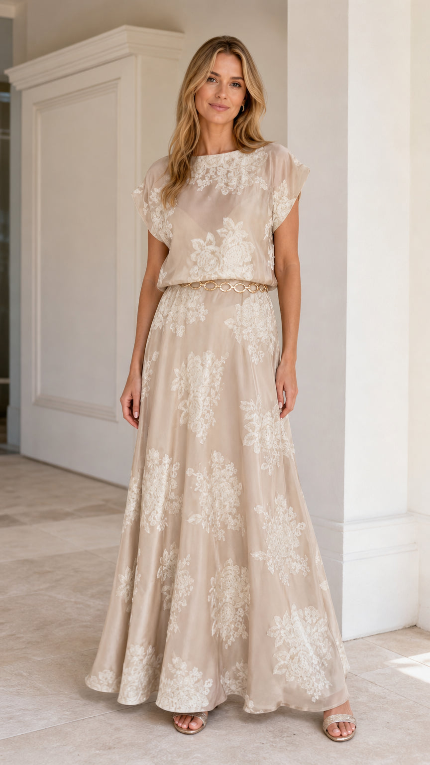 Model wearing Champagne floral embroidered maxi dress from the front view