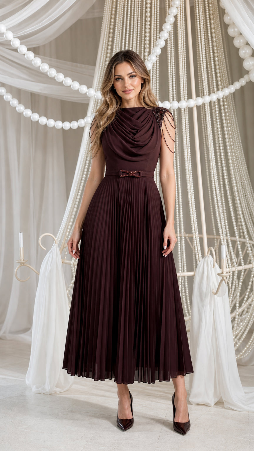 Front view of burgundy pleated midi dress with beaded shoulders