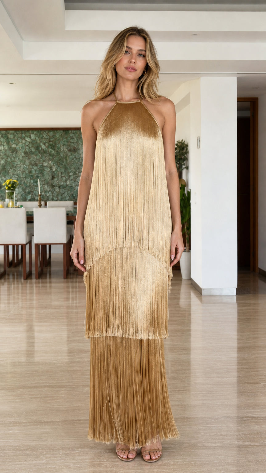 Model wearing Gold Tiered Fringe Halter Maxi Dress from the front