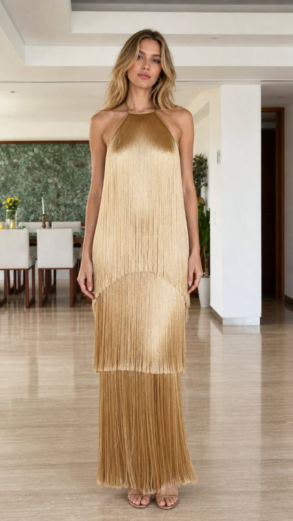 Model wearing Gold Tiered Fringe Halter Maxi Dress from the front