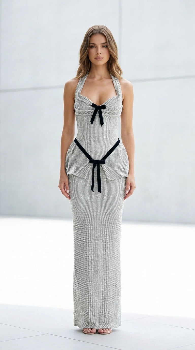 Front view of silver glitter halter maxi dress with velvet bows