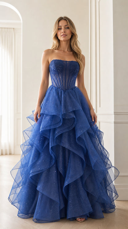 Front view of royal blue strapless glitter tulle tiered ball gown with corset bodice