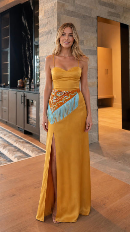 Front view of yellow satin evening gown with beaded fringe waist