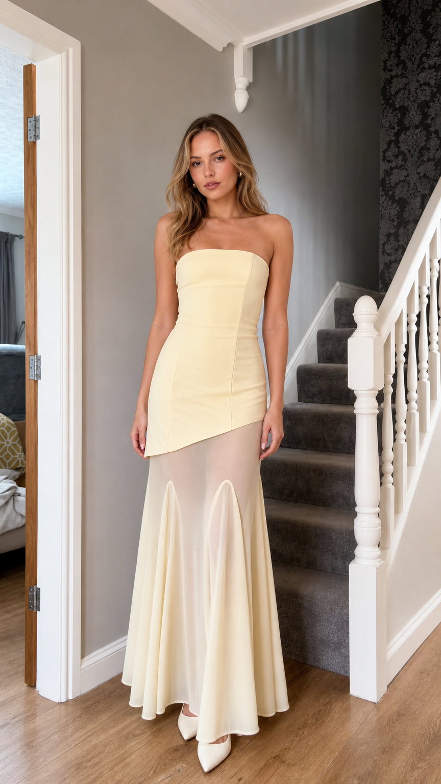 Front view of light yellow strapless asymmetric mermaid maxi dress