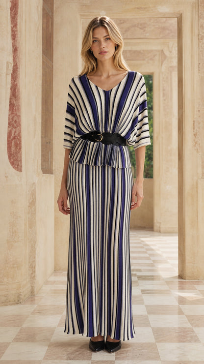 Front view of woman wearing blue striped two-piece maxi dress set