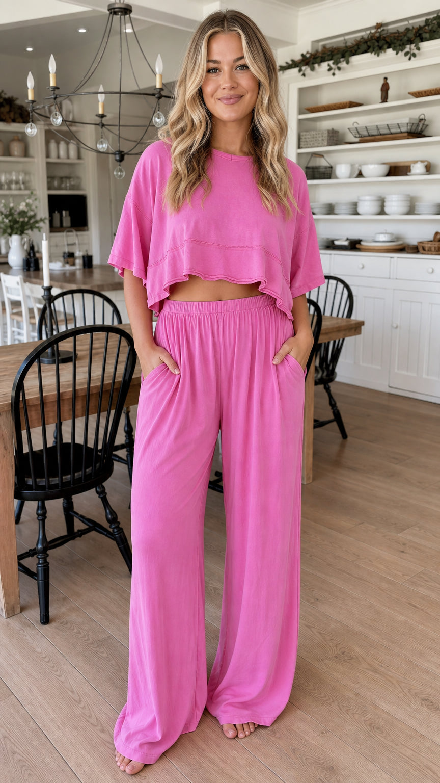 Front view of woman wearing fuchsia cropped tee and wide leg pants lounge set
