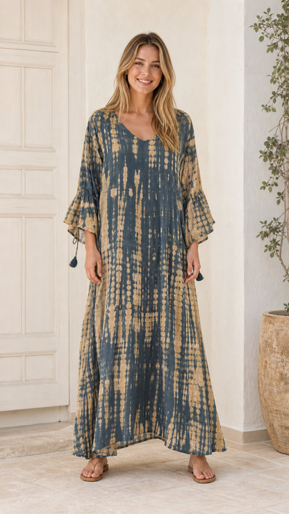 Front view of model wearing Blue tie-dye maxi dress