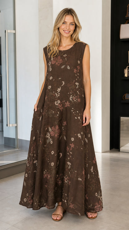 Front view of model wearing brown floral sleeveless maxi dress