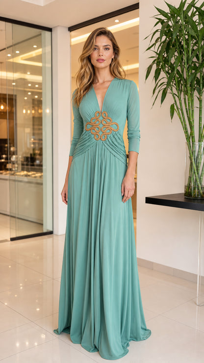 Sage green deep V-neck ruched maxi dress with gold waist motif front view