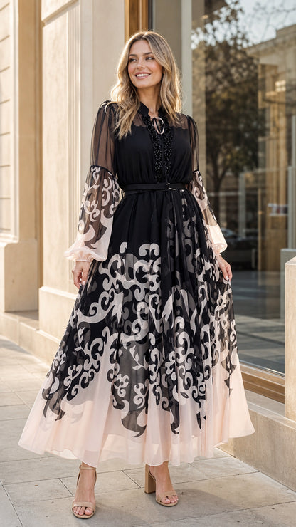 Model wearing black and blush scroll print chiffon maxi dress front view