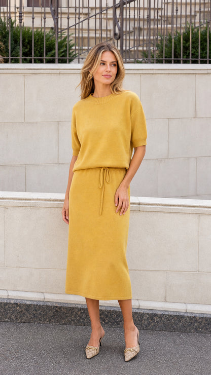 Mustard short sleeve knit midi dress with drawstring waist shown from the front