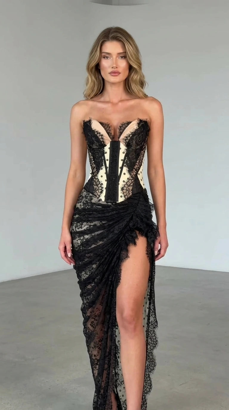 Front view of champagne strapless corset maxi dress
