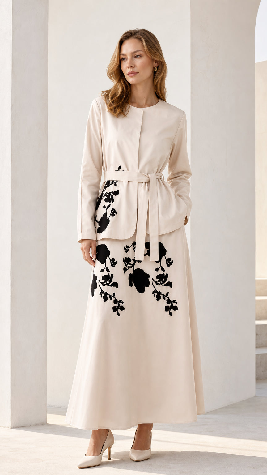 Front view of beige floral embroidered belted maxi dress
