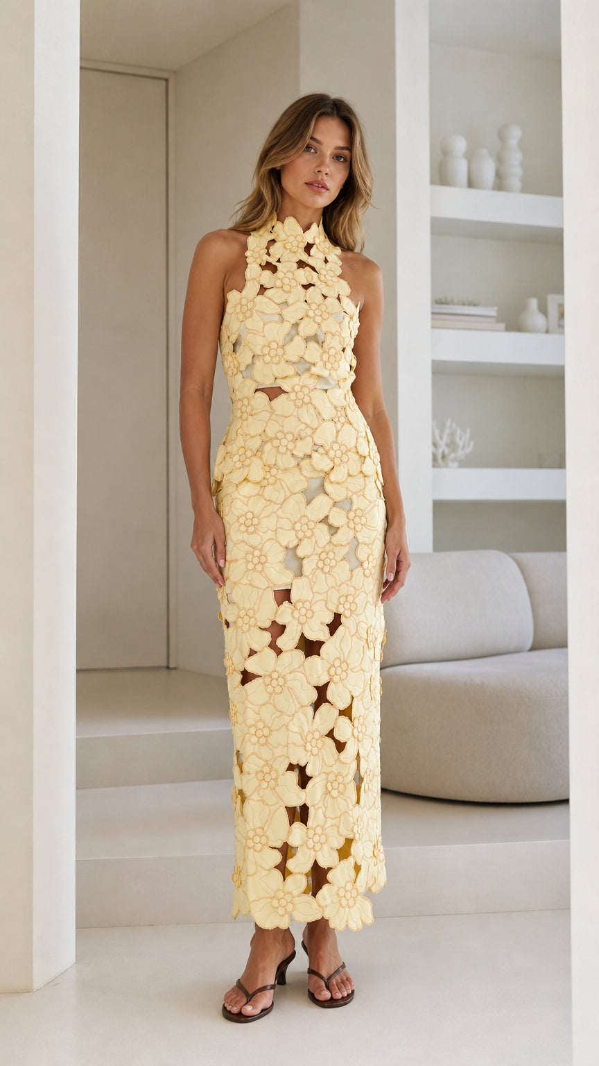 Front view of Yellow floral laser-cut halter midi dress