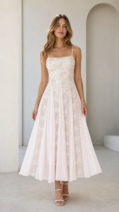 Front view of pink floral embroidered midi dress on model